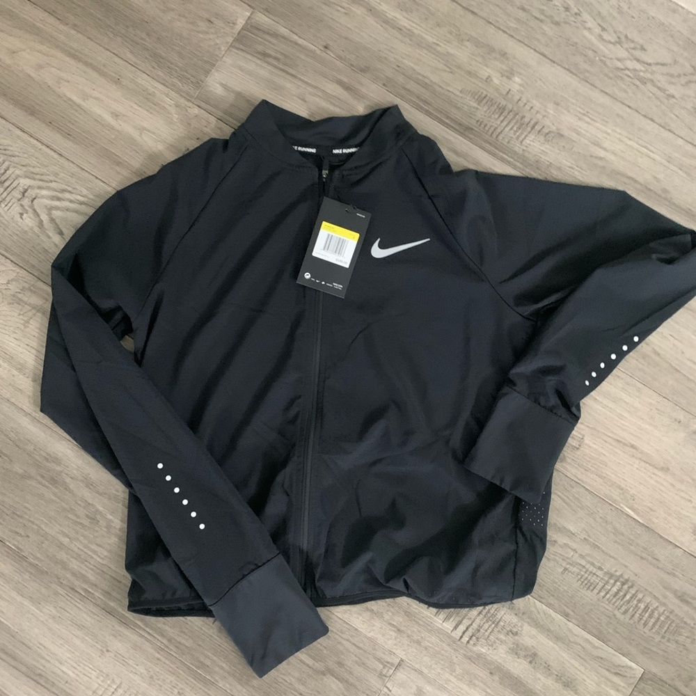 BRAND NEW Nike Zip-up. Size Small.
